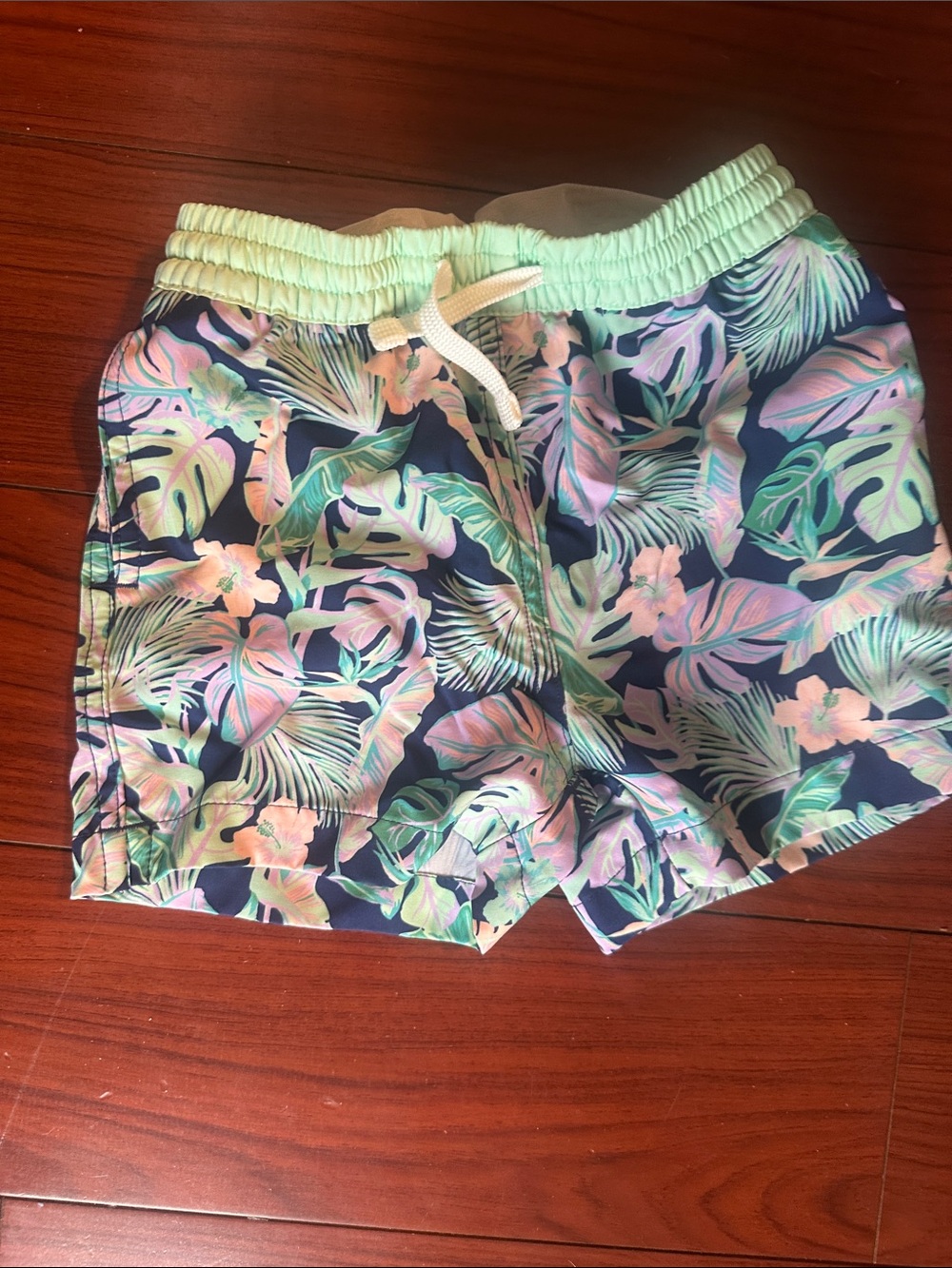 chubbies Kids Navy Floral Swim Trunks with Mint Waistband